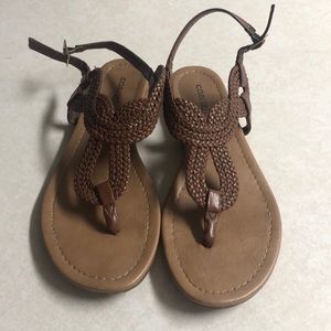 Woman’s brown sandals